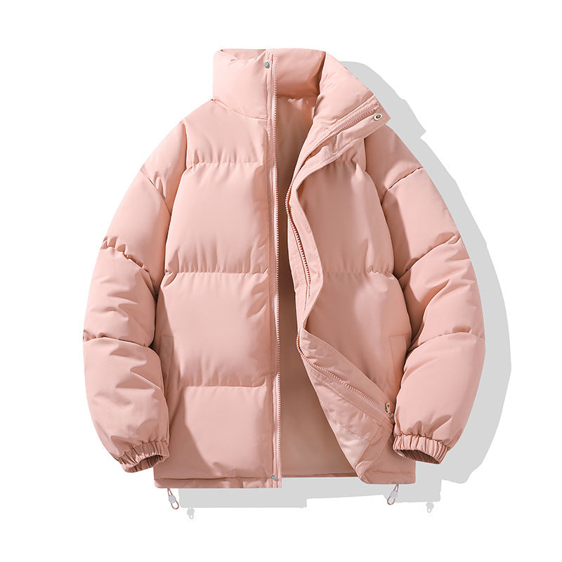 Giacca invernale imbottita rosa chiaro, con zip frontale e polsini elasticizzati. Moda donna, abbigliamento caldo, stile casual.