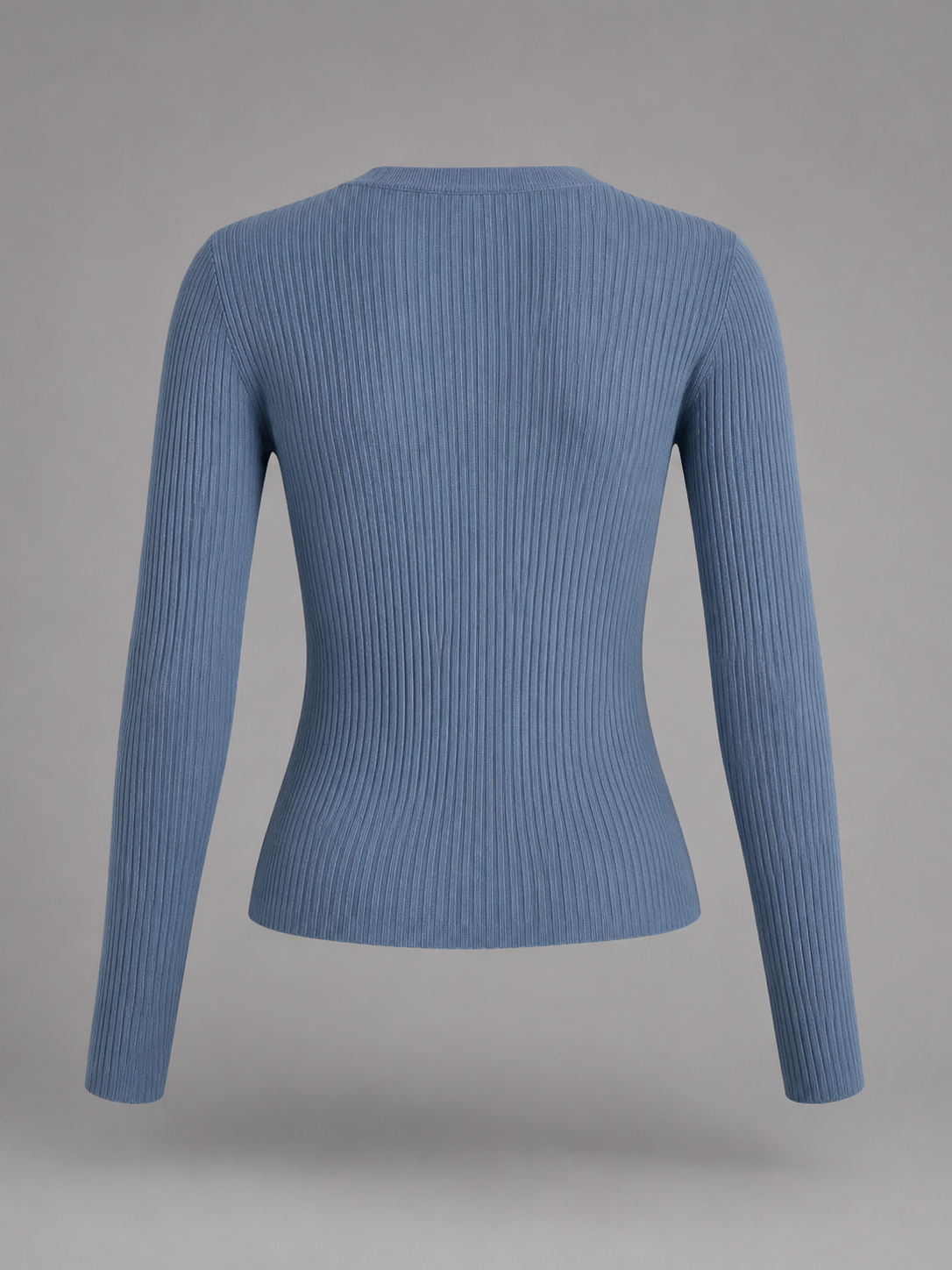 Camiseta Henley de mujer acanalada, ajustada, de manga larga y con escote abotonado.