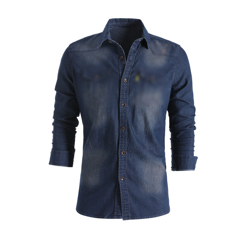 Men's solid-color denim shirt with textured fabric, chest pockets, and long sleeves.