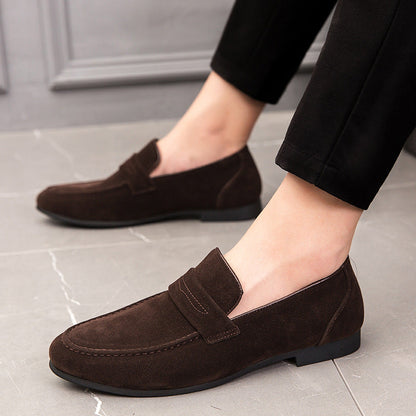 Men’s suede loafers with a minimalist design and padded insole.