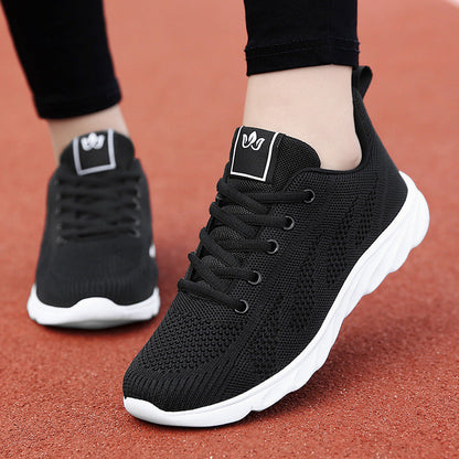 Zapatillas deportivas para mujer en malla con suela de EVA y cierre frontal con cordones