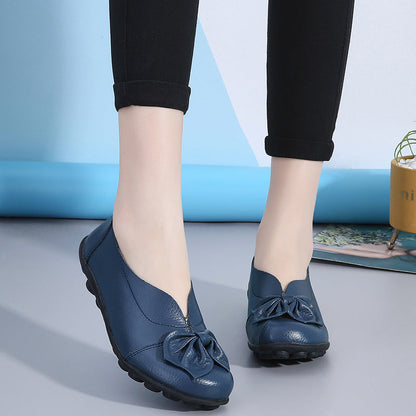 Zapatos bajos de mujer de piel de vacuno con detalles florales