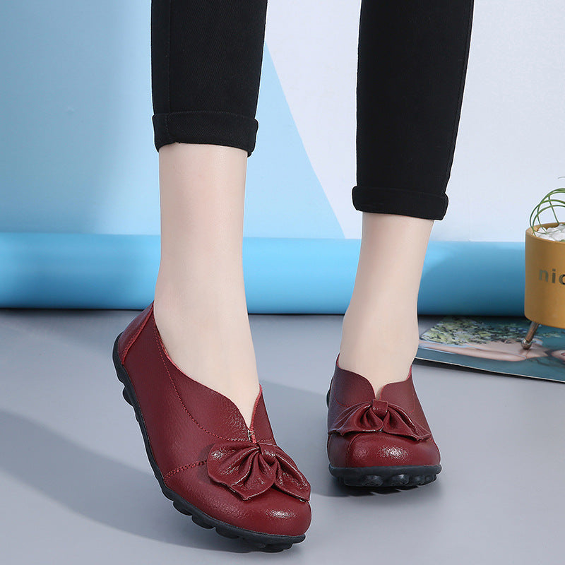 Zapatos bajos de mujer de piel de vacuno con detalles florales