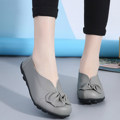 Zapatos bajos de mujer de piel de vacuno con detalles florales