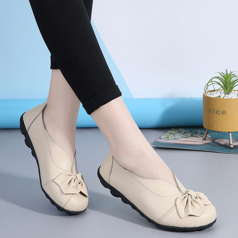 Zapatos bajos de mujer de piel de vacuno con detalles florales
