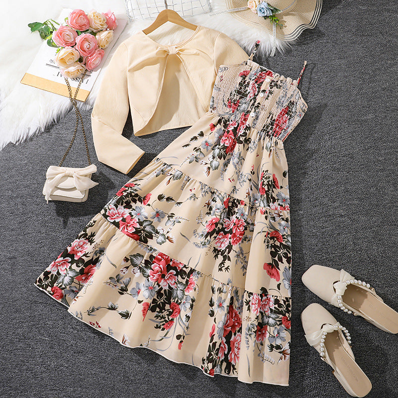 Vestido de niña con tirantes, estampado floral y mangas largas