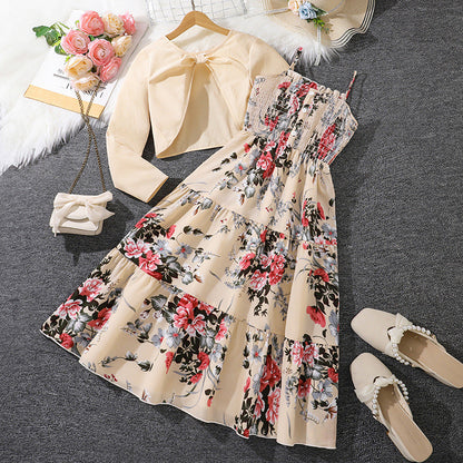 Vestido de niña con tirantes, estampado floral y mangas largas