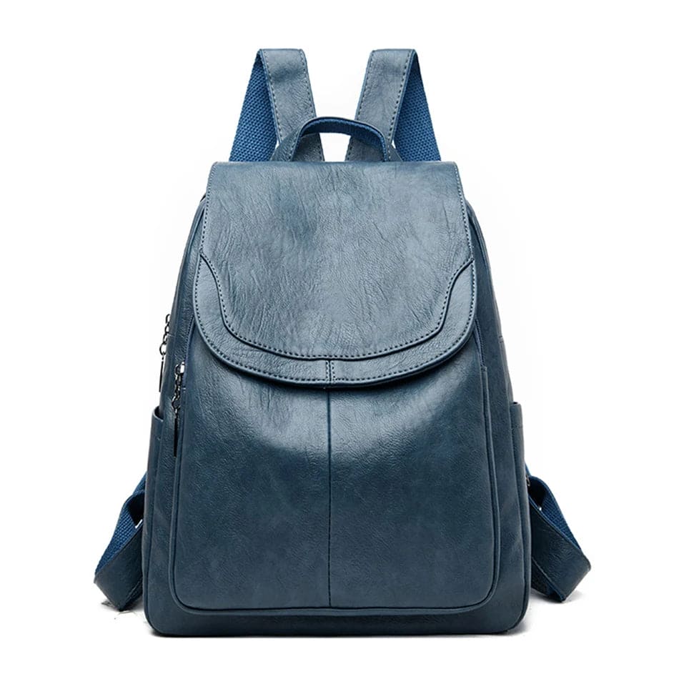 Zaino in pelle blu elegante, design moderno, con tasche multiple e spallacci regolabili. Ideale per scuola, lavoro e viaggi.