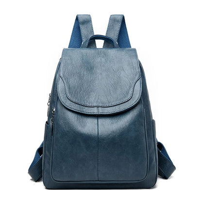 Zaino in pelle blu elegante, design moderno, con tasche multiple e spallacci regolabili. Ideale per scuola, lavoro e viaggi.