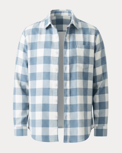 Camisa de hombre a cuadros con botones, corte cómodo, cuello con solapas y mangas largas.