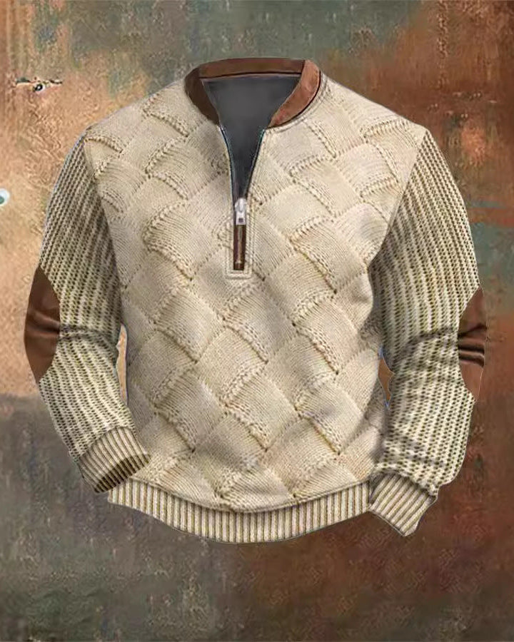 Maglione beige lavorato a maglia con motivo intrecciato, cerniera frontale e dettagli in pelle marrone su gomiti e colletto, moda autunno inverno.