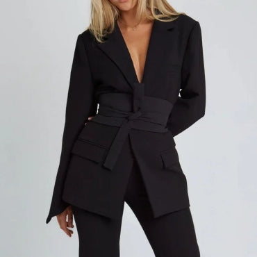 Women's autumn blazer with a belt and long bell sleeves.