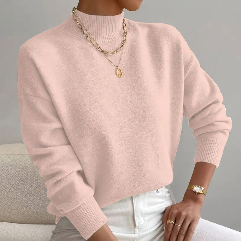 Women's cashmere turtleneck sweater with a straight fit and ribbed trims.