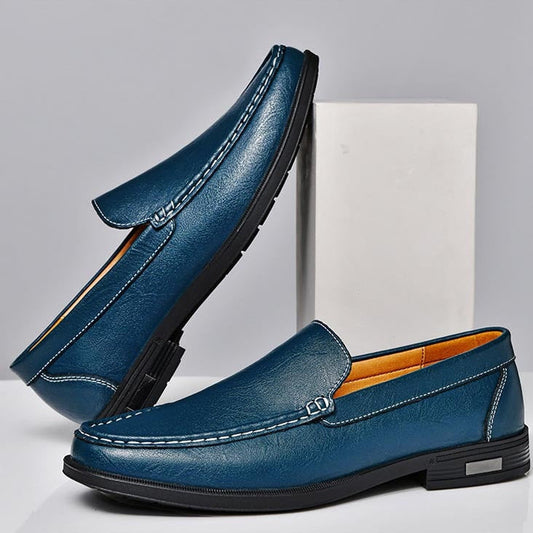 Men's genuine leather loafers, slip-on, with contrast stitching and rubber soles.