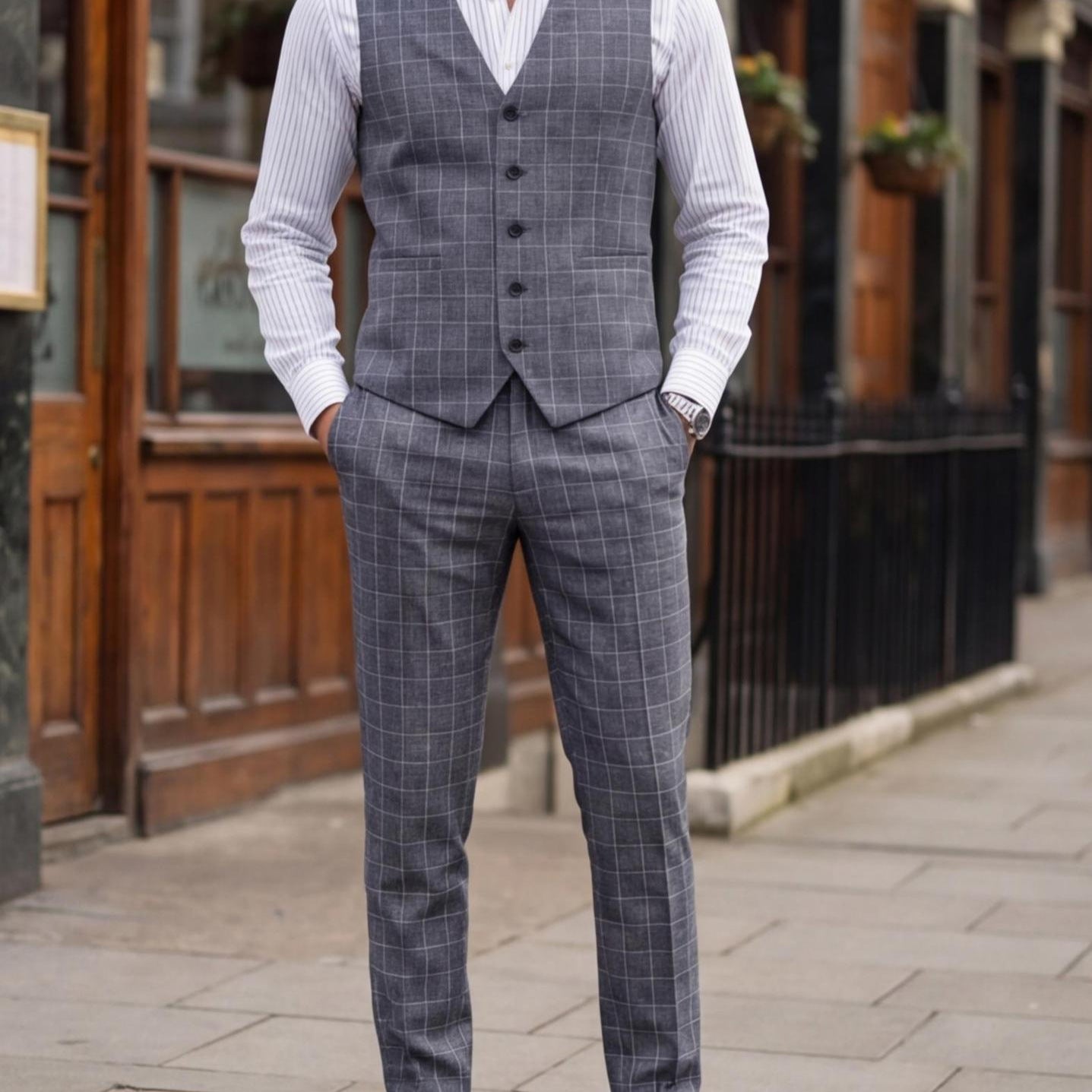 Herredragt i to dele med ternet vest og elegante bukser – Businessstil