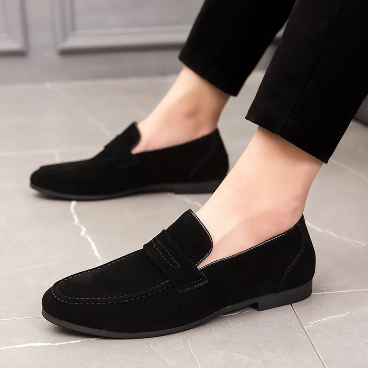 Men’s suede loafers with a minimalist design and padded insole.