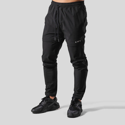 Pantaloni Sportivi Uomo a Gamba Dritta – Vestibilità Ampia con Assorbimento dell’Umidità
