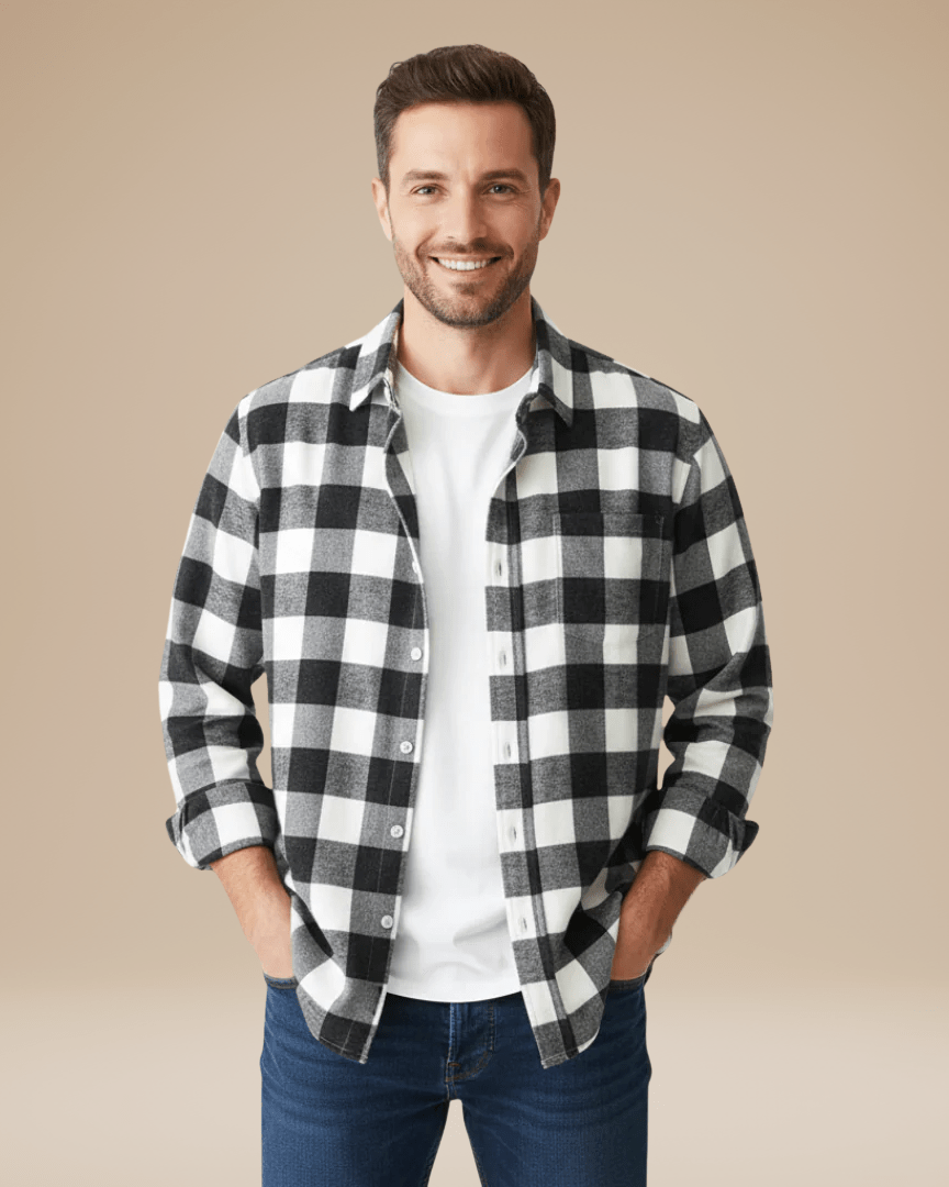 Camisa de hombre a cuadros con botones, corte cómodo, cuello con solapas y mangas largas.