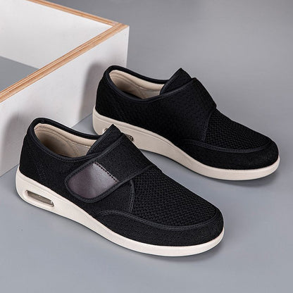 Men's breathable mesh walking shoes with adjustable Velcro strap and cushioned sole.
