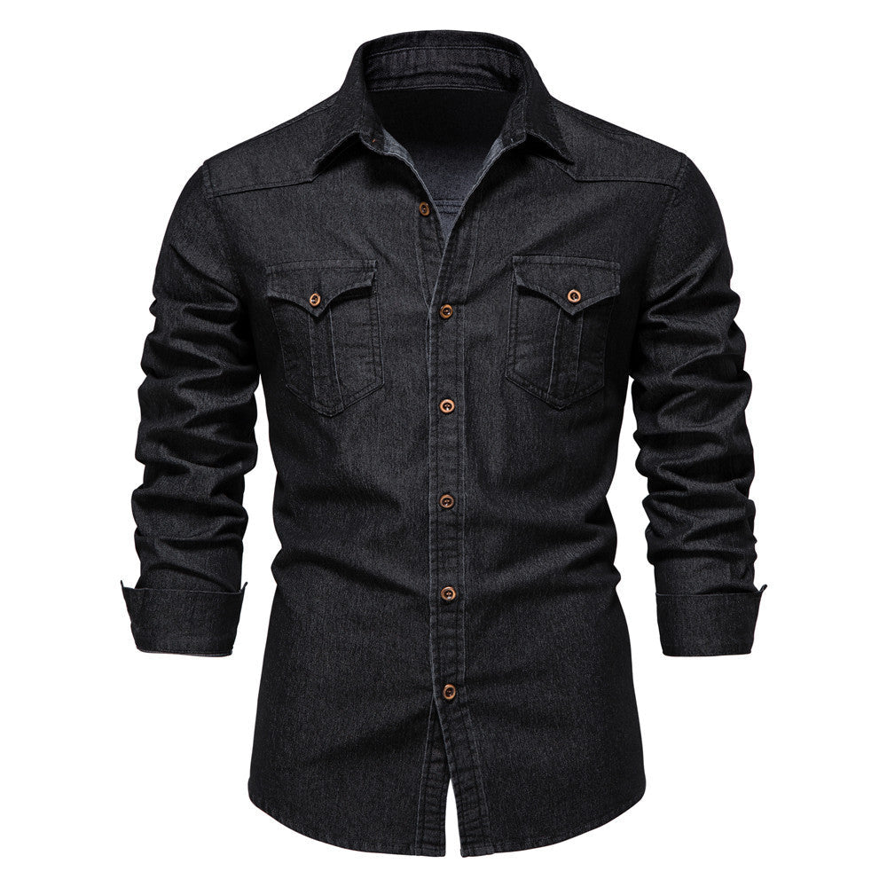Men's solid-color denim shirt with textured fabric, chest pockets, and long sleeves.