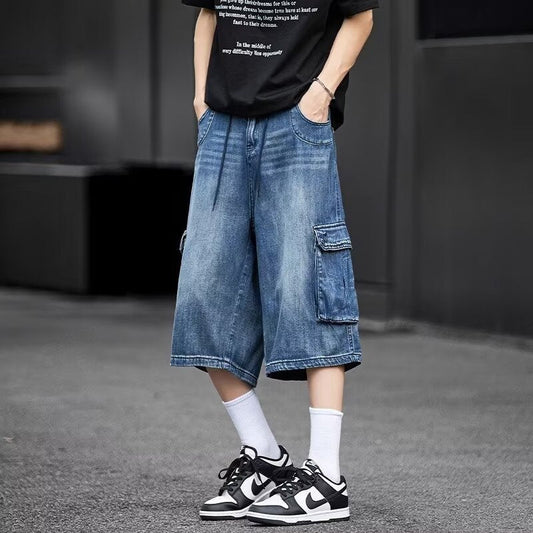 Herre Capri-bukser i denim med mange lommer og rummelig pasform