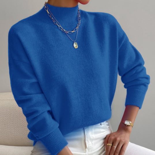 Women's cashmere turtleneck sweater with a straight fit and ribbed trims.