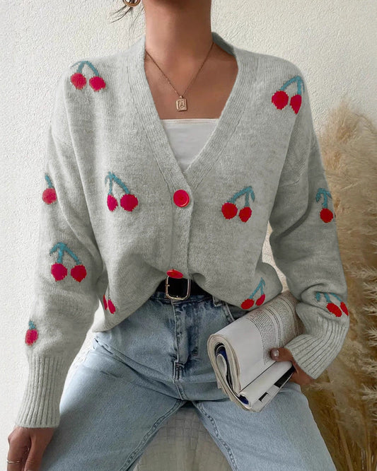 Løs sweater til kvinder med dekorative knapdetaljer