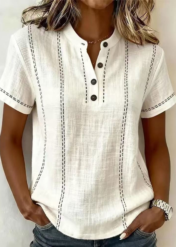 Damebluse med korte ærmer, ståkrave, V-hals og knapper – patchwork-design