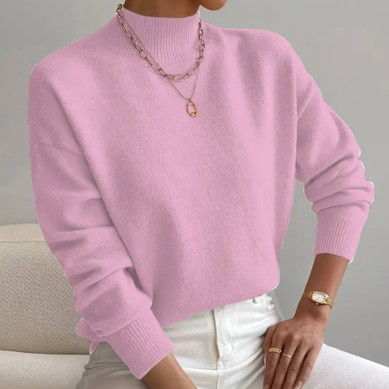 Women's cashmere turtleneck sweater with a straight fit and ribbed trims.