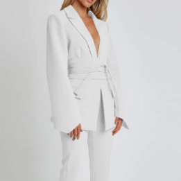 Women's autumn blazer with a belt and long bell sleeves.