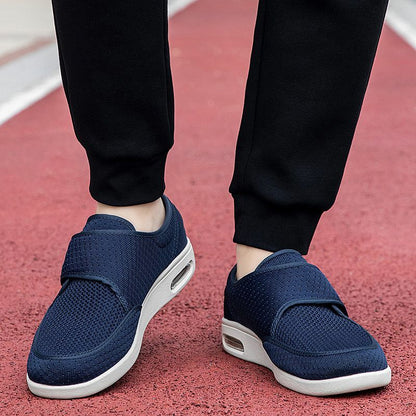 Men's breathable mesh walking shoes with adjustable Velcro strap and cushioned sole.