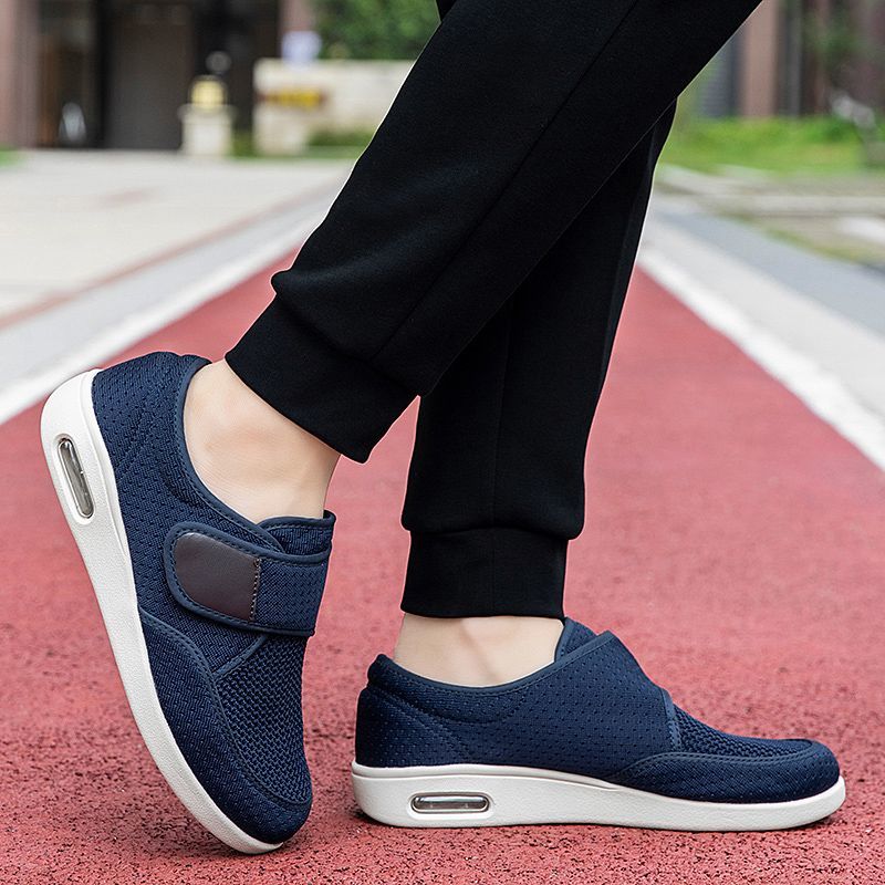 Men's breathable mesh walking shoes with adjustable Velcro strap and cushioned sole.