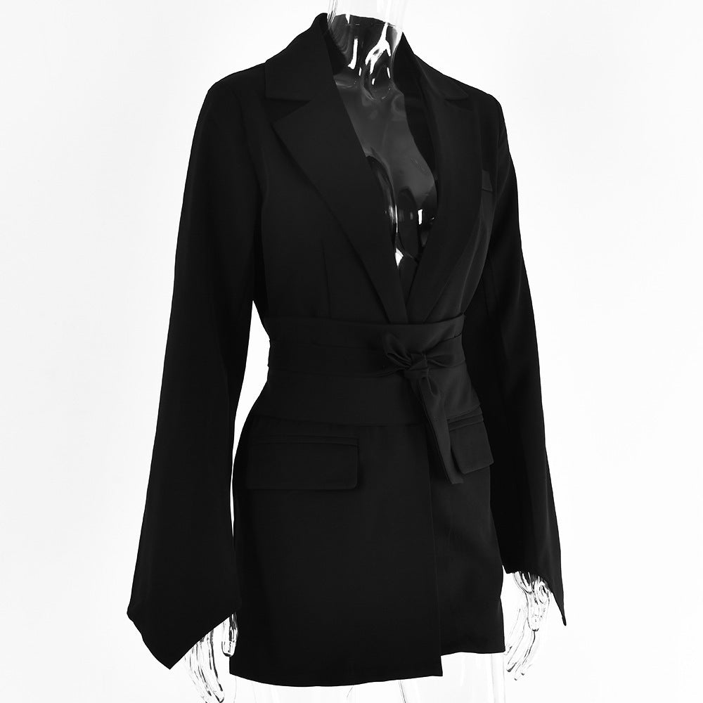 Women's autumn blazer with a belt and long bell sleeves.
