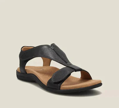 Sandalo nero in pelle da donna con suola ergonomica e cinturino regolabile. Calzatura estiva comoda e alla moda per passeggiate e tempo libero.