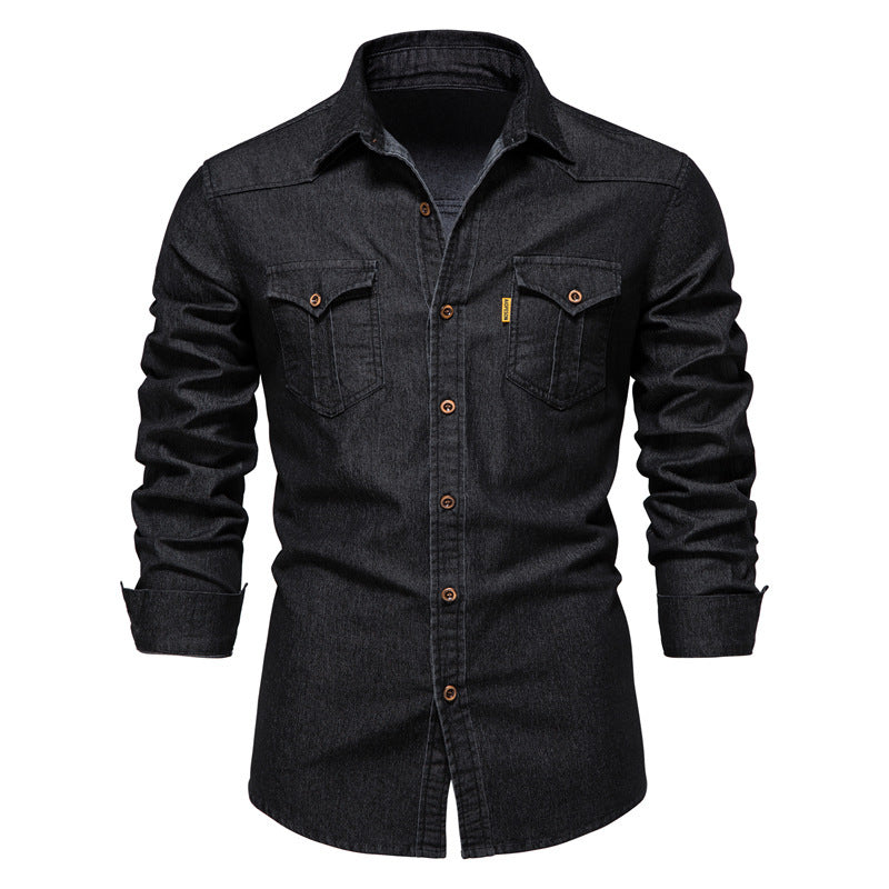 Men's solid-color denim shirt with textured fabric, chest pockets, and long sleeves.