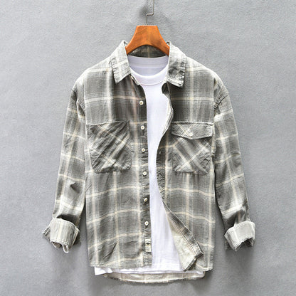 Camisa de hombre de otoño a cuadros de algodón, corte holgado y manga larga.
