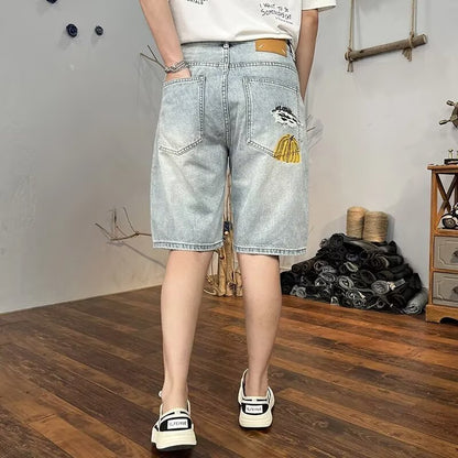 Pantaloncini Uomo Cropped con Effetto Strappato e Lavaggio Chiaro – Stile Denim
