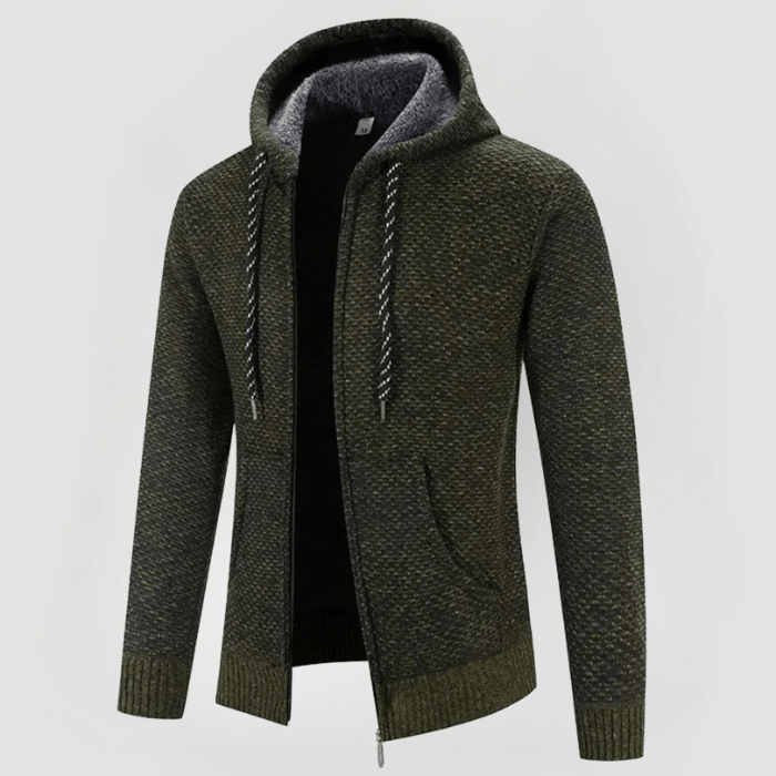 Felpa con cappuccio verde oliva, tessuto a maglia, zip frontale, tasche laterali, interno foderato in pile grigio, cordini bianchi e neri.