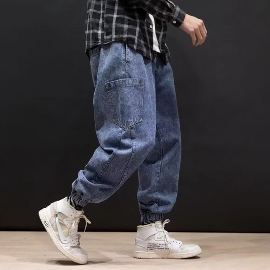 Jeans til mænd med afslappet pasform og broderier – Mellem talje og bred silhuet