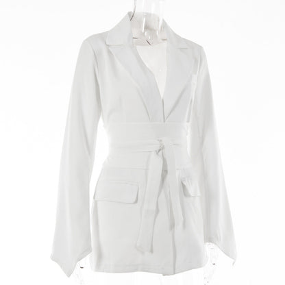 Women's autumn blazer with a belt and long bell sleeves.