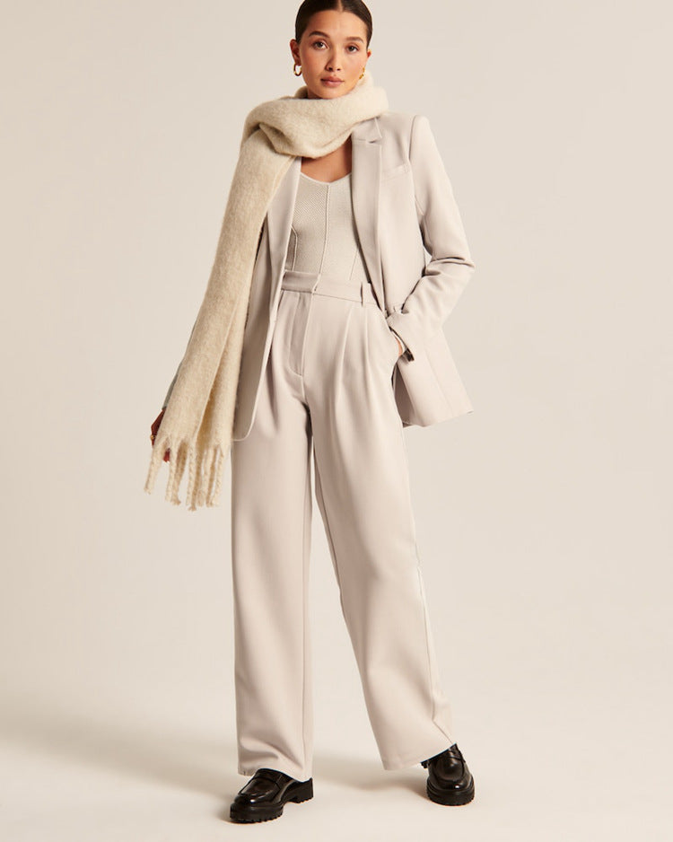 Pantaloni donna a vita alta con gamba ampia e tasche laterali
