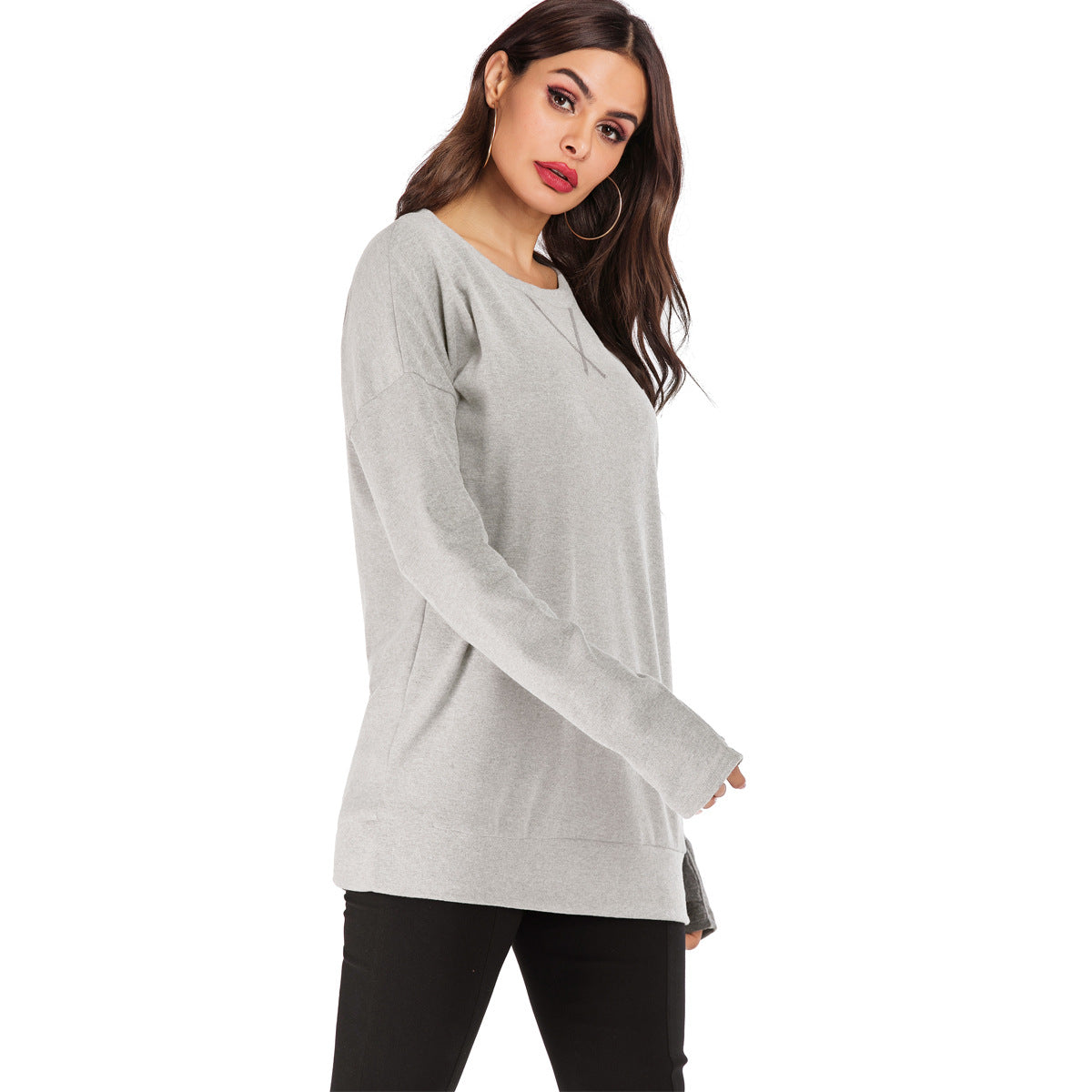 Jersey de mujer de manga larga con cuello redondo, ajuste holgado y color liso