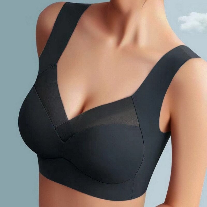 Reggiseno sportivo nero senza cuciture, design a V, spalline larghe, comfort e supporto, ideale per attività fisica e quotidiana.