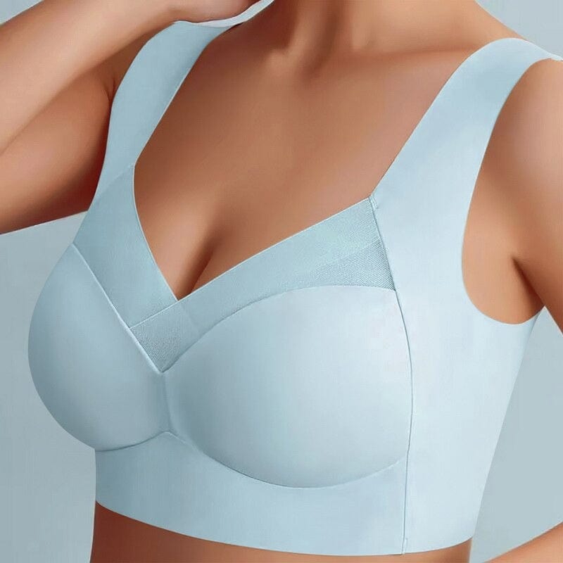 Reggiseno sportivo senza cuciture azzurro, design confortevole e supporto ottimale, ideale per attività fisica e uso quotidiano.