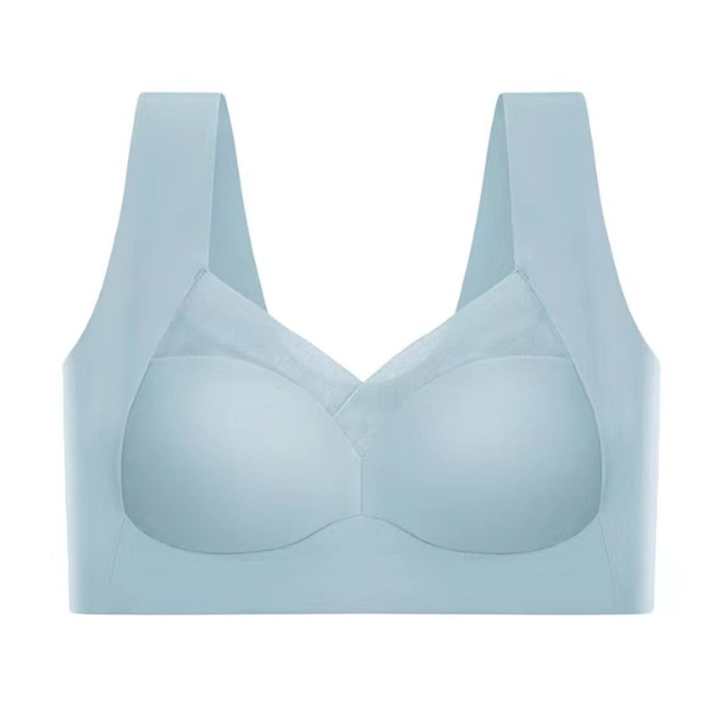 Reggiseno sportivo blu chiaro senza cuciture, design a V, spalline larghe, supporto confortevole. Intimo donna fitness, moda activewear.