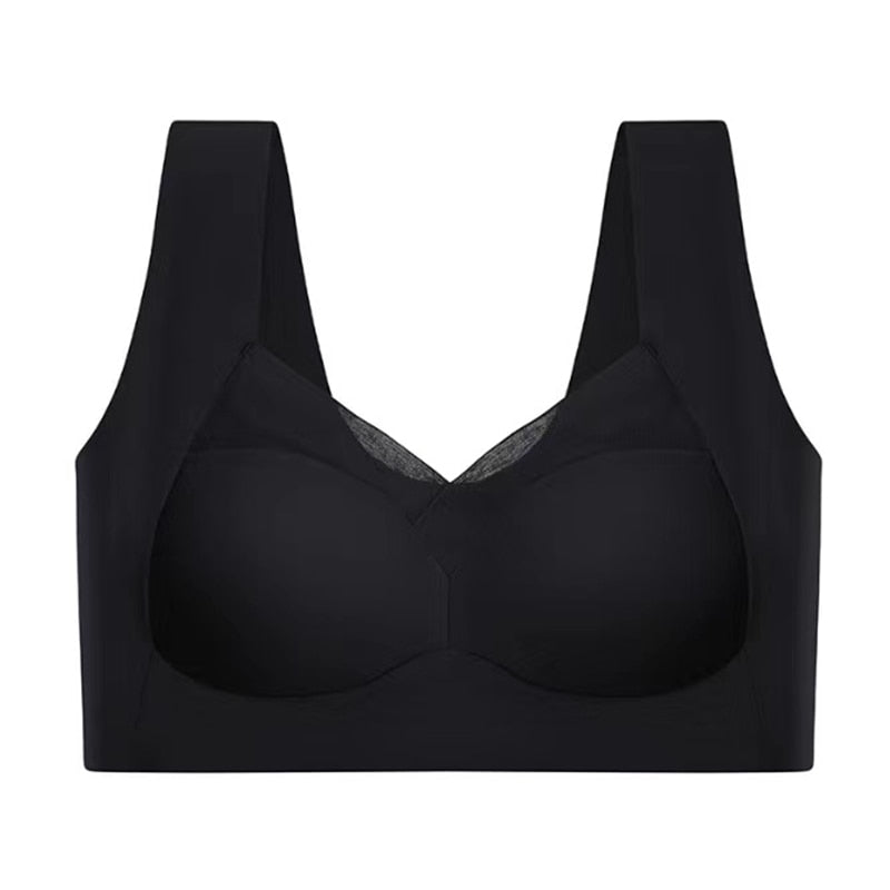 Reggiseno sportivo nero senza cuciture, design confortevole e supporto ottimale. Intimo fitness donna, tessuto traspirante e elasticizzato.