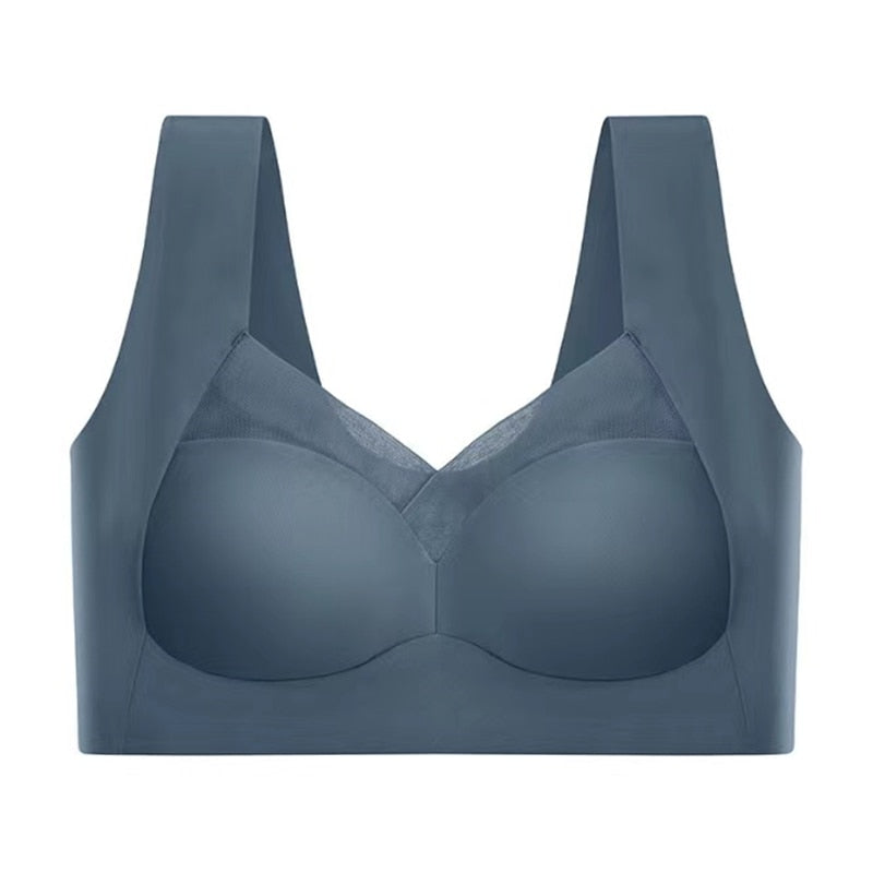 Reggiseno sportivo blu scuro senza cuciture, design a coppa piena, spalline larghe, supporto confortevole, ideale per attività sportive e quotidiane.