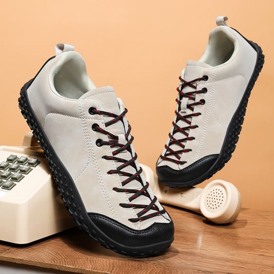 Men’s minimalist hiking shoes with a wide toe box, flexible sole, and water-resistant design.
