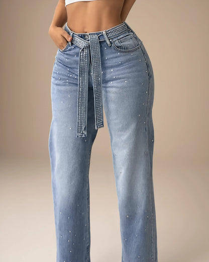 Jeans de mujer de cintura alta y pernera recta con adornos y tejido vaquero.