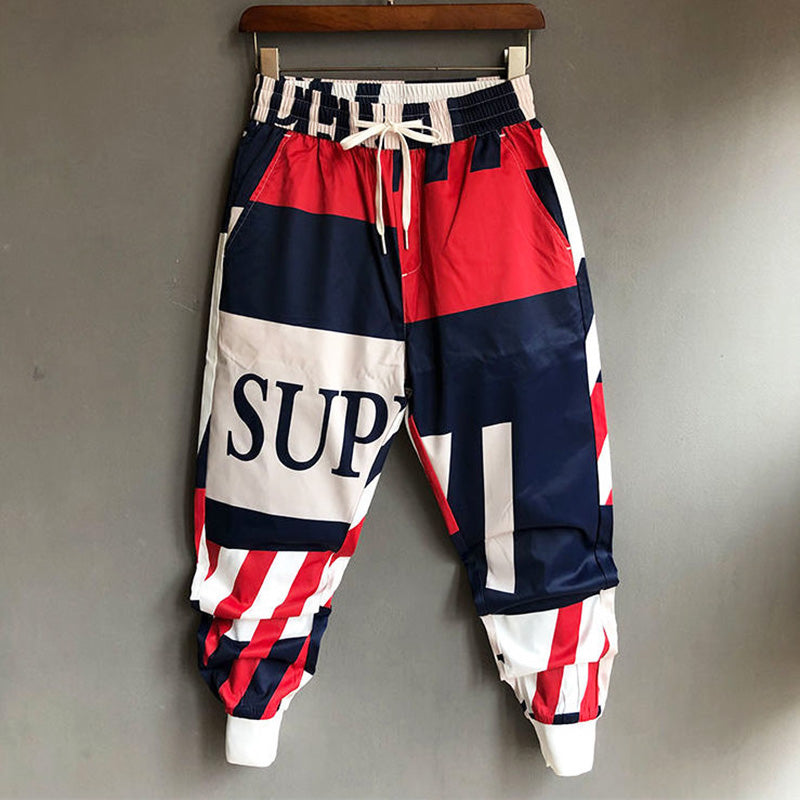 Men's Graffiti Print Pants with Elastic Waist and Ribbed Cuffs – Streetwear Style